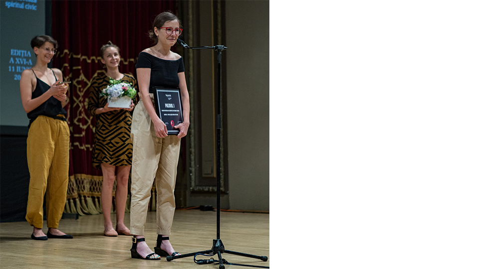Me on stage accepting the award and making the speech. In the back there are my two collegues smiling.