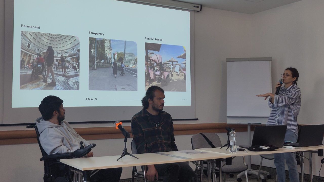Iris, Alex and Alex presenting with images behind them on the wall.